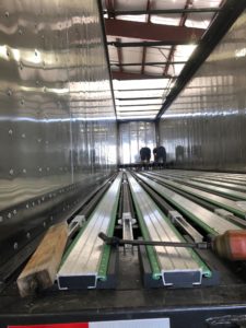 slats and subdeck view of drop deck trailer